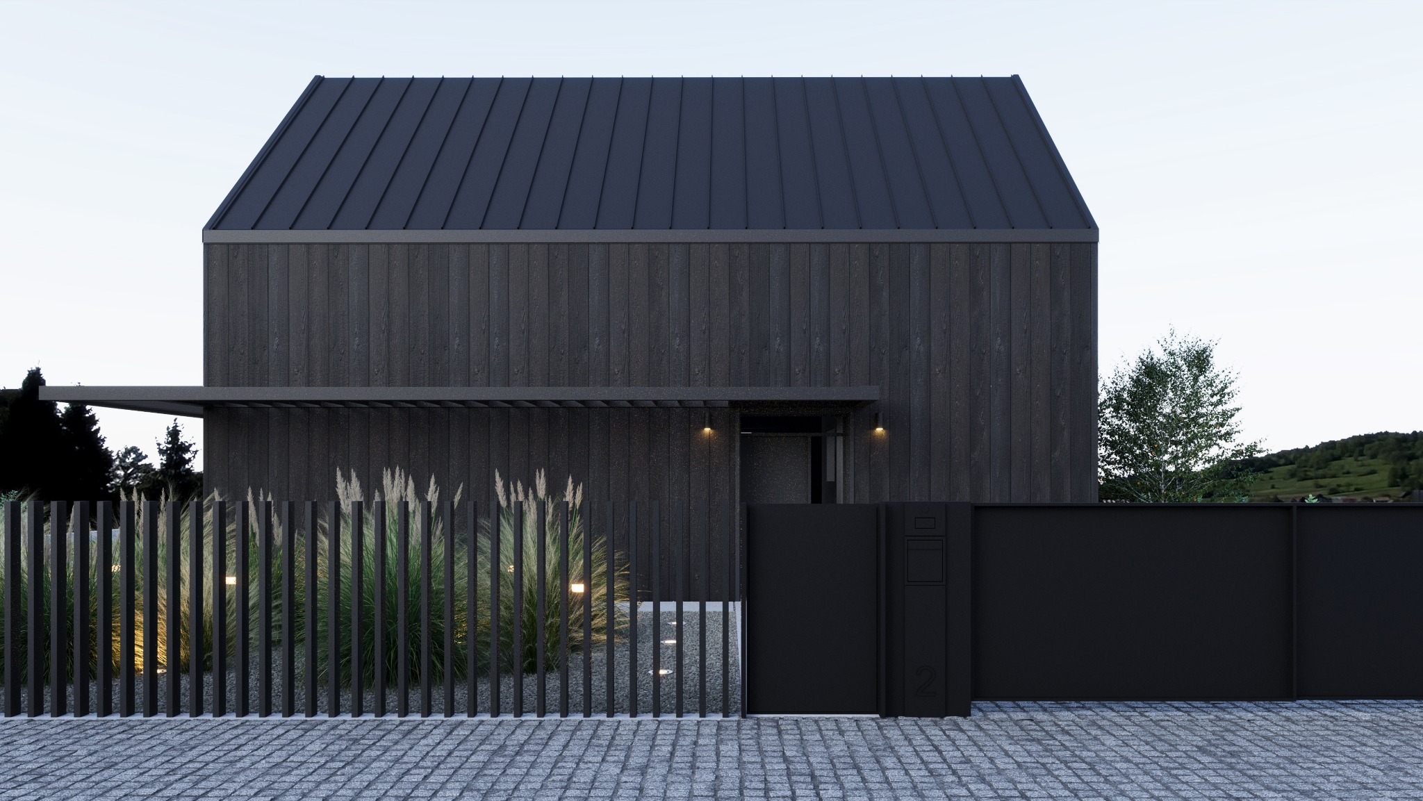 Nowoczesny dom o minimalistycznej bryle z czarną drewnianą elewacją, płaskim dachem i oświetlonym ogrodem z ozdobnymi trawami za metalowym ogrodzeniem.