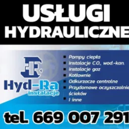 Reklama firmy hydraulicznej Hyd-Ra z numerem telefonu 669 007 291, oferującej pompy ciepła, instalacje C.O. i wodno-kanalizacyjne, instalacje gazowe, kotłownie oraz odkurzacze centralne.