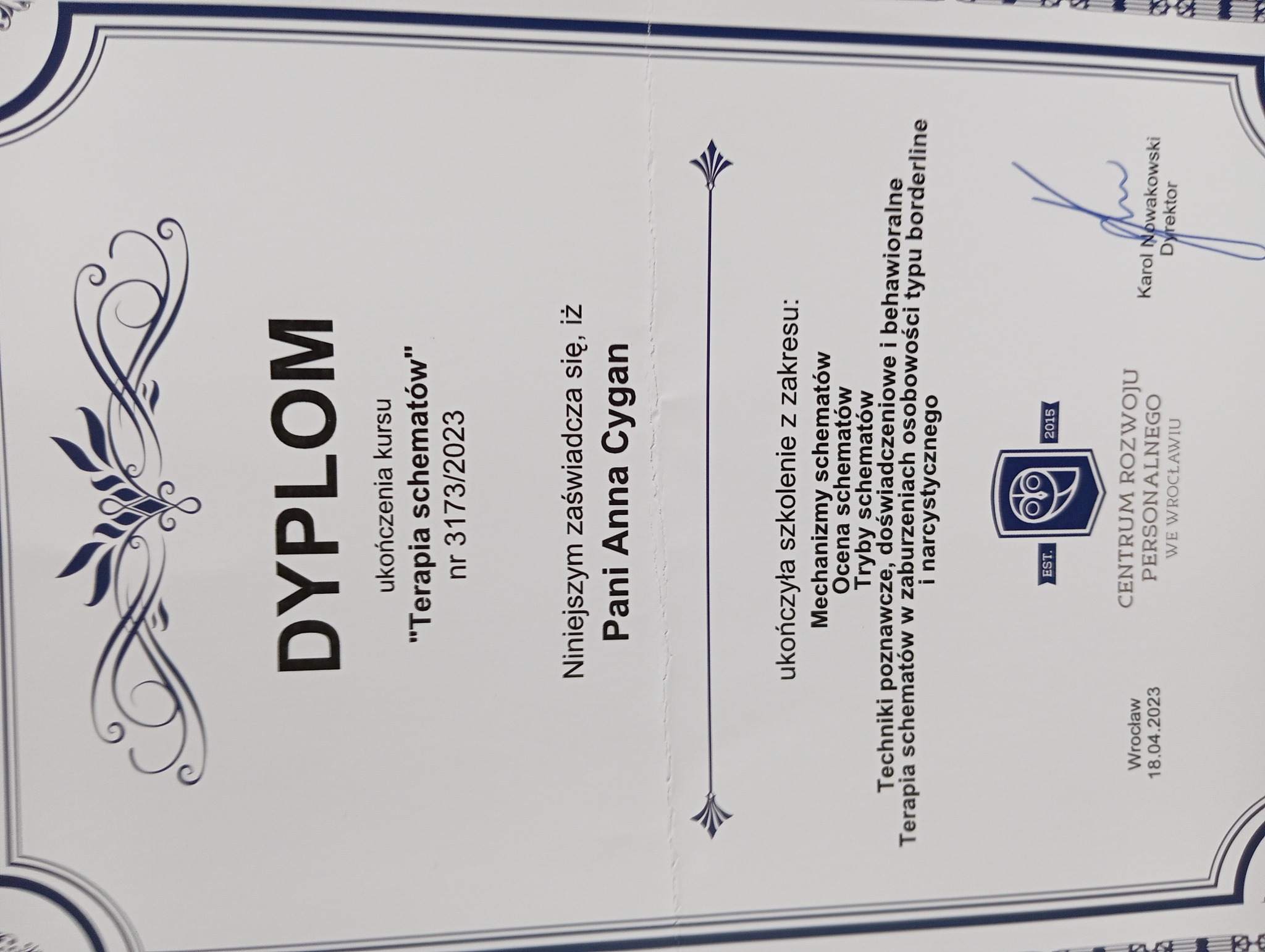 Dyplom ukończenia kursu 'Terapia schematów' z datą 18.04.2023, wydany dla Pani Anny Cygan przez Centrum Rozwoju Personalnego we Wrocławiu, podpisany przez Dyrektora Karola Nowakowskiego.