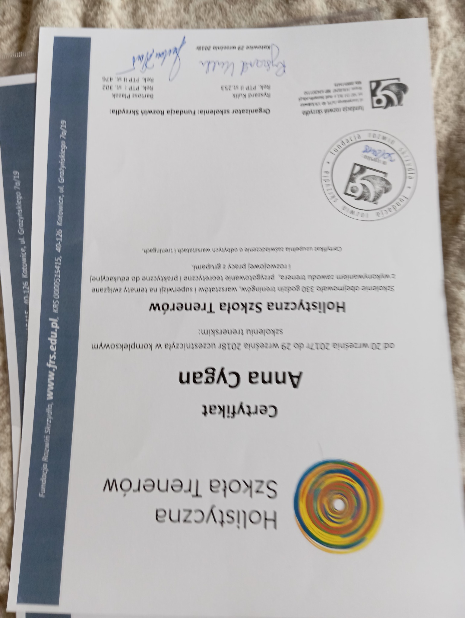 Certyfikat ukończenia szkolenia trenerskiego, wydany przez Fundację Rozwiń Skrzydła, z podpisami Ryszarda Kulika i Bartosza Plazaka.