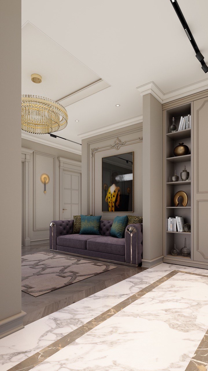 Elegancki salon z fioletową sofą, marmurową podłogą i dekoracyjnym oświetleniem. Na ścianie obraz w złotej ramie. Widoczna zabudowa meblowa z półkami.