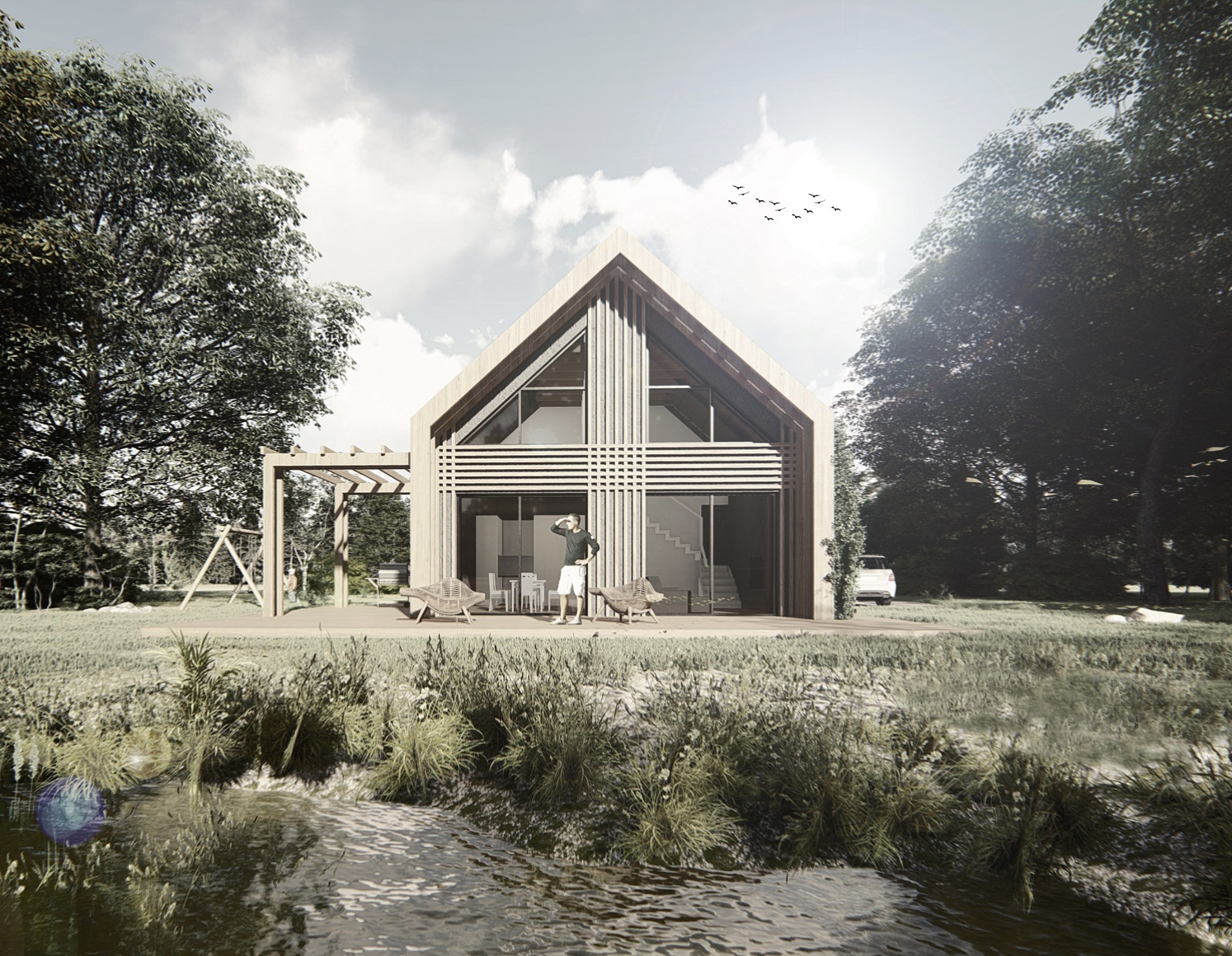 Wizualizacja nowoczesnego domu jednorodzinnego z drewnianą elewacją, dużymi przeszkleniami i tarasem z widokiem na jezioro, na którym stoi mężczyzna w szortach i podziwia widoki.