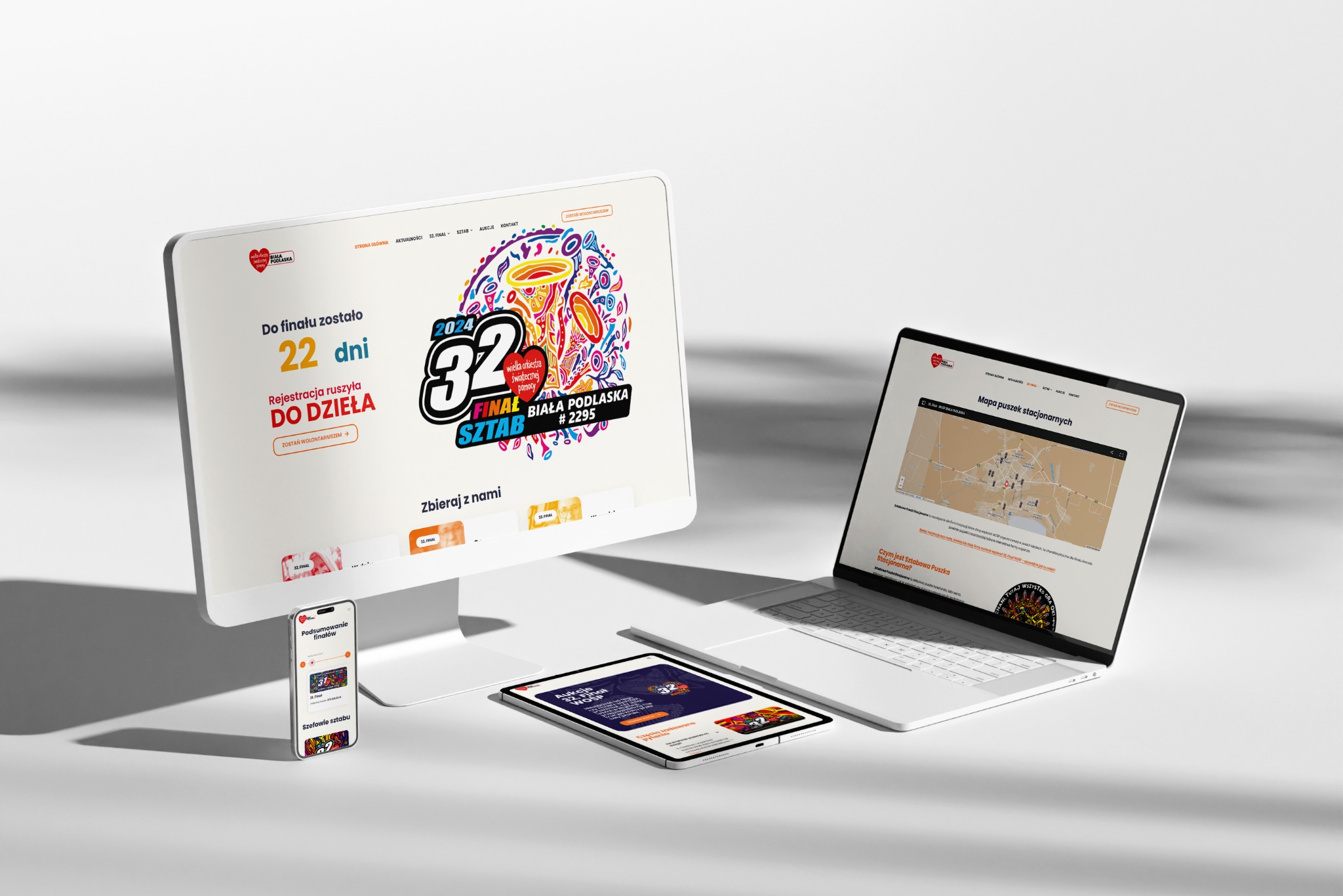 Prezentacja responsywnej strony internetowej na monitorze, laptopie, tablecie i smartfonie, promująca 32. Finał Wielkiej Orkiestry Świątecznej Pomocy w Białej Podlaskiej, z mapą punktów...