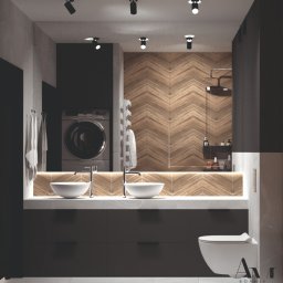 BonnieAM ALEKSANDRA MIKOŁAJCZYK - Nowoczesna łazienka z drewnianą ścianą w jodełkę, dwiema okrągłymi umywalkami nablatowymi, czarnymi szafkami pod umywalką, podwieszaną toaletą i pralką w tle.