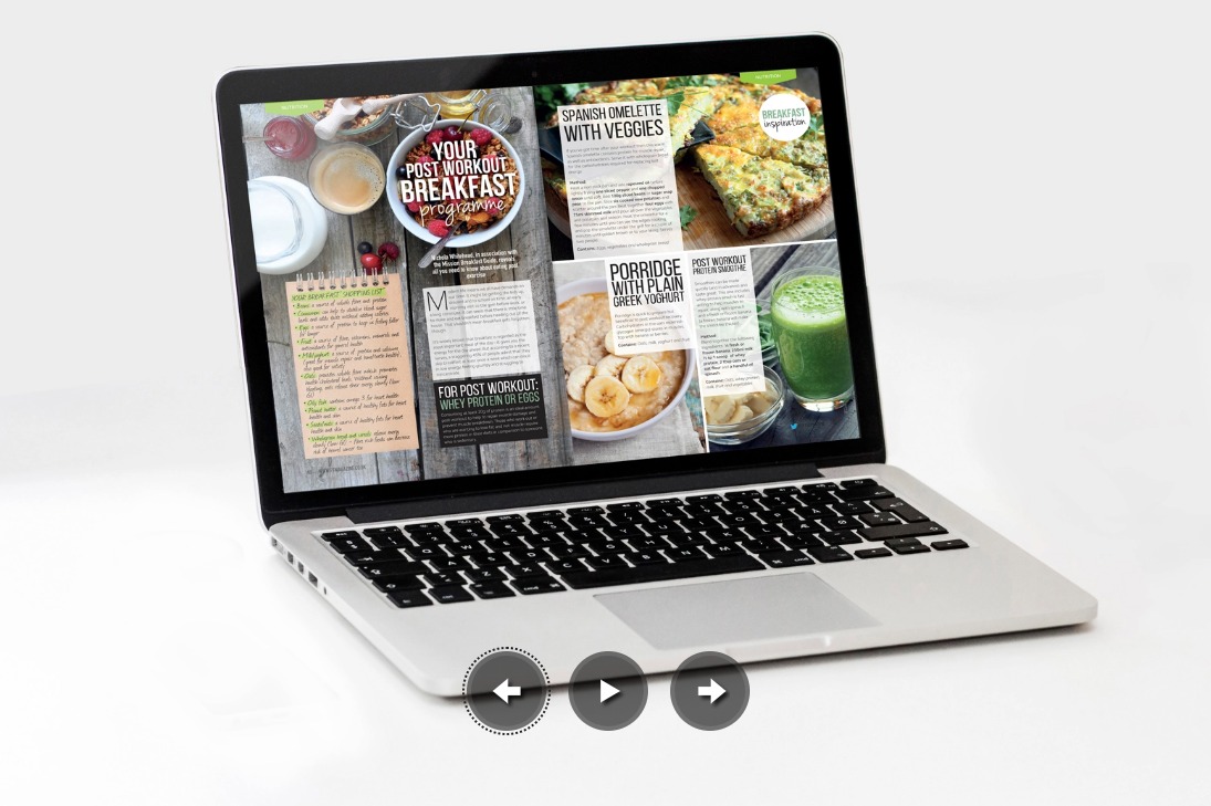 Laptop wyświetla artykuł o przepisach na śniadania po treningu, prezentując zdjęcia potraw i listę zakupów, na białym tle.