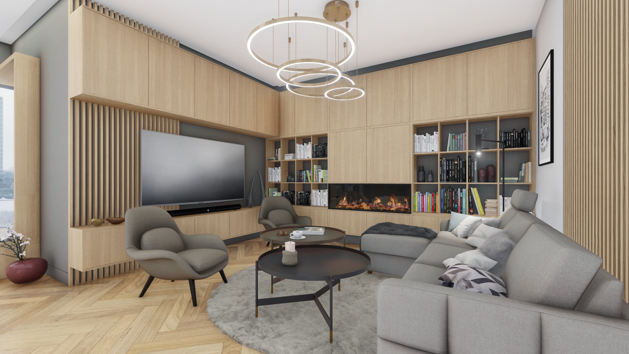 Salon z drewnianą zabudową, kominkiem, szarą sofą i fotelami na tle parkietu w jodełkę. Okrągłe lampy sufitowe i stoliki kawowe.