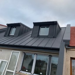 Zakład Ogólnobudowlany Dariusz Misiura - Montaż pokrycia dachowego z blachy na „click” wraz z opierzeniami blacharskimi własnej produkcji.