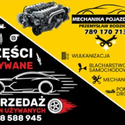 Grafika reklamowa warsztatu samochodowego z silnikiem, używanymi częściami, oponami, numerami telefonów i usługami takimi jak wulkanizacja i pomoc drogowa.