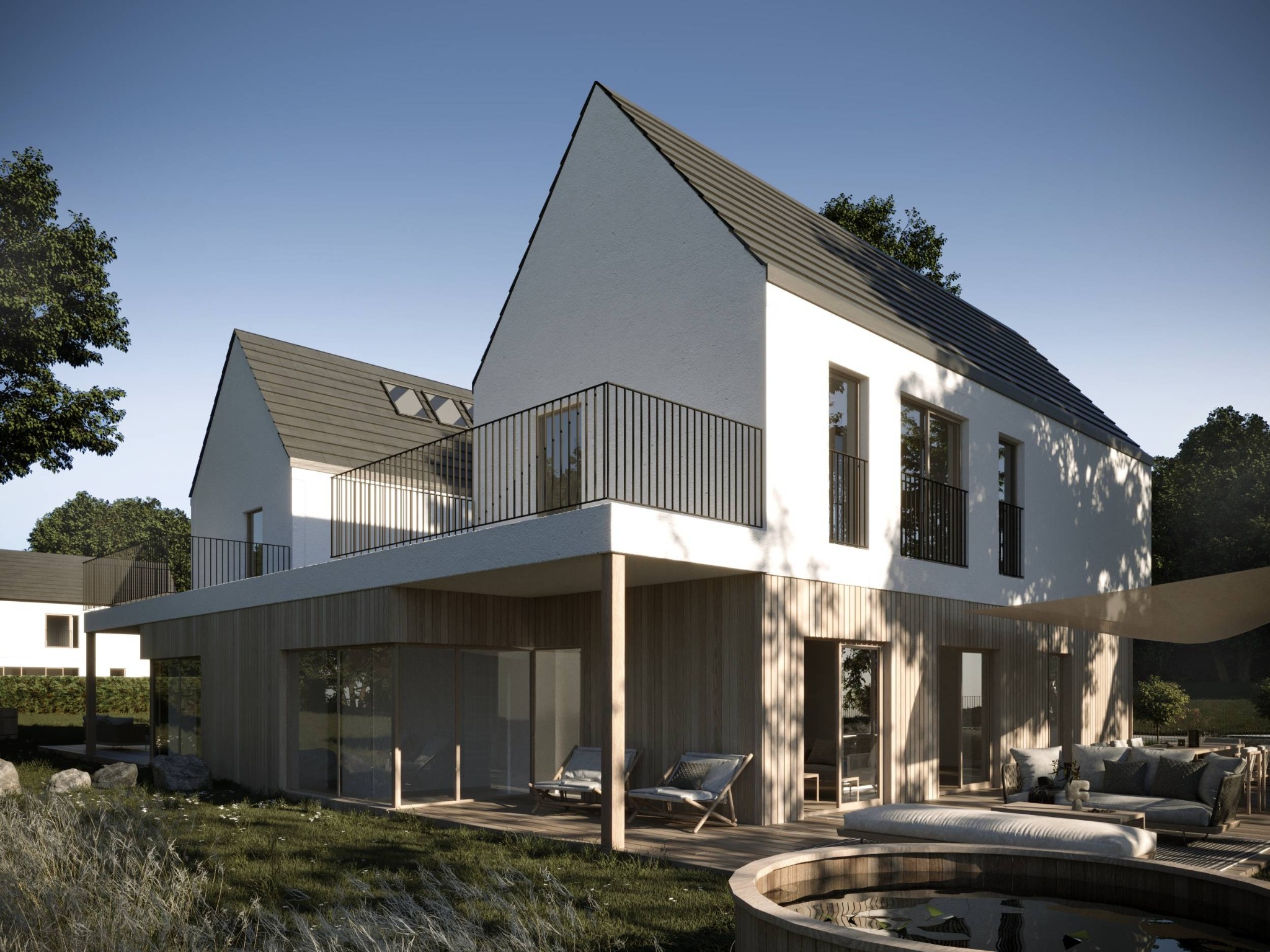 Wizualizacja nowoczesnego domu z białymi ścianami i drewnianą elewacją, taras z meblami wypoczynkowymi i małym oczkiem wodnym na pierwszym planie, w tle zieleń i inne budynki.