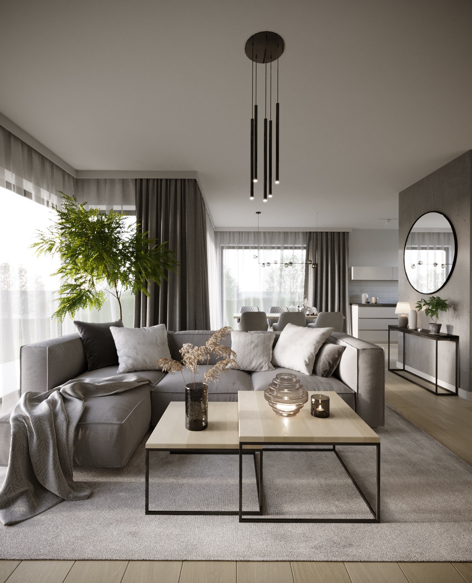 Jasne wnętrze salonu z szarym narożnikiem, drewnianymi stolikami kawowymi, dekoracyjnym oświetleniem i roślinami, utrzymane w minimalistycznym stylu z widoczną jadalnią w tle.