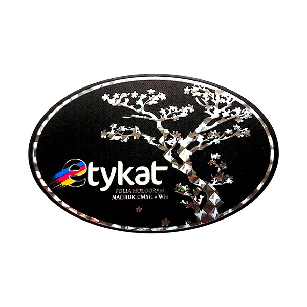 Owalna, czarna naklejka z logo firmy 'etykat', motywem drzewa bonsai z folii holograficznej i napisem 'FOLIA HOLOGRAM NADRUK CMYK + WH'.