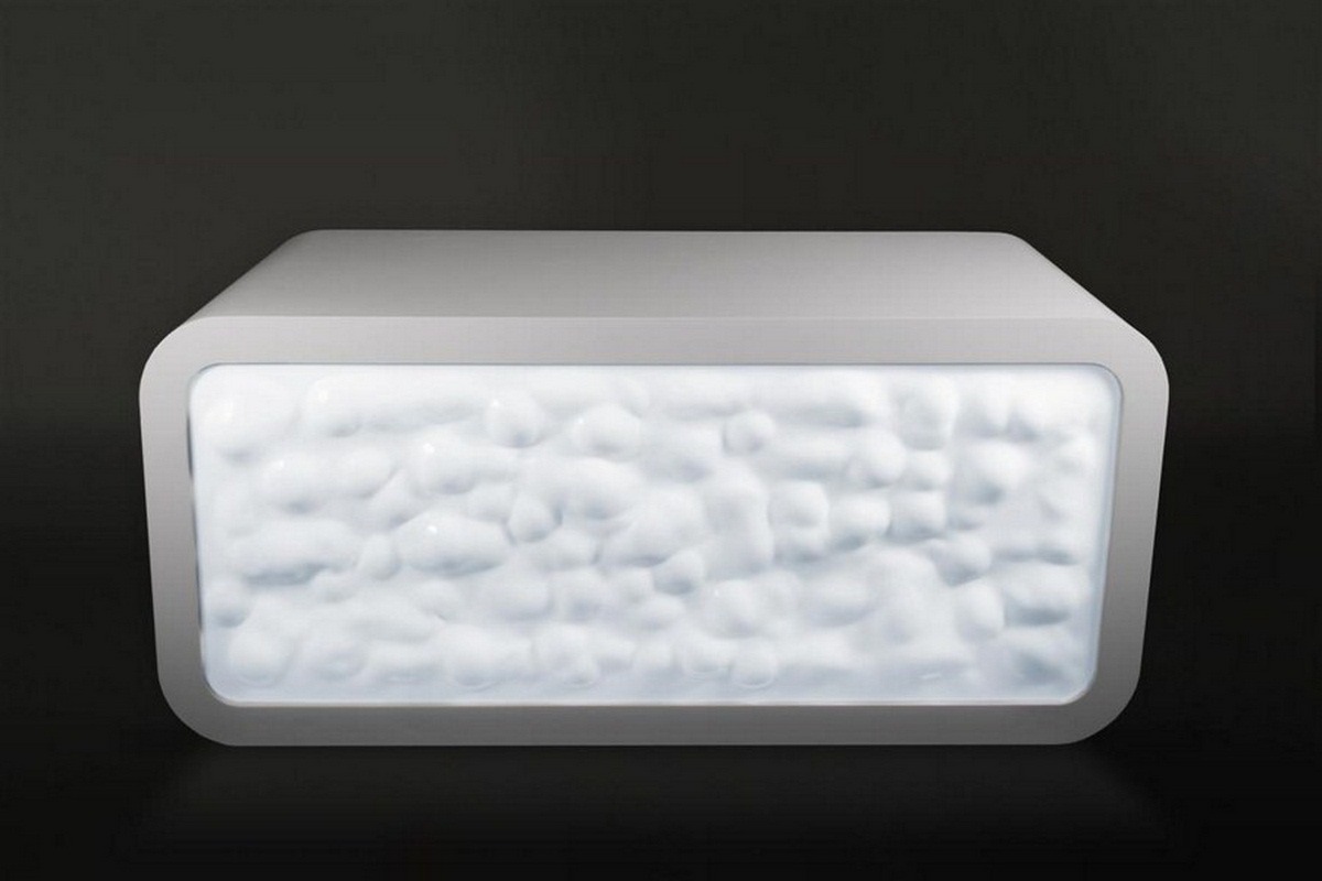 Podświetlany panel dekoracyjny z efektem trójwymiarowej, nieregularnej faktury, umieszczony w minimalistycznej, szarej ramie o zaokrąglonych krawędziach na ciemnym tle.