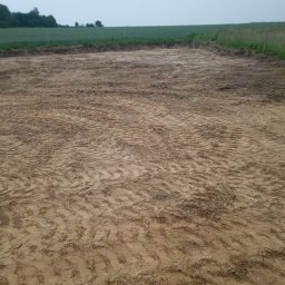 LesiuKop Krzysztof i Tomasz Leśniak s.c. - Wyrównanie terenu pod budowę domu.