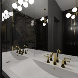 KKS GROUP - Elegancka łazienka z podwójną umywalką o futurystycznym kształcie, złotą armaturą i oświetleniem kulistym; na ścianie widoczny motyw graficzny nawiązujący do antyku.