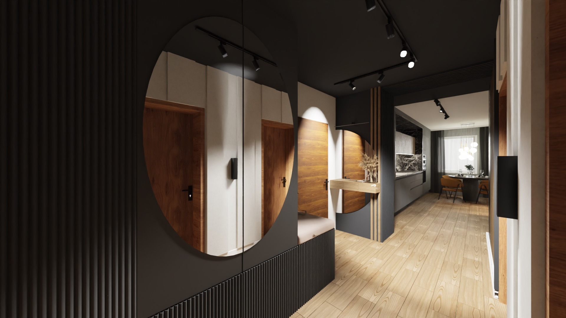 Nowoczesny przedpokój z dużym okrągłym lustrem, drewnianą podłogą i widokiem na kuchnię z jadalnią w tle.