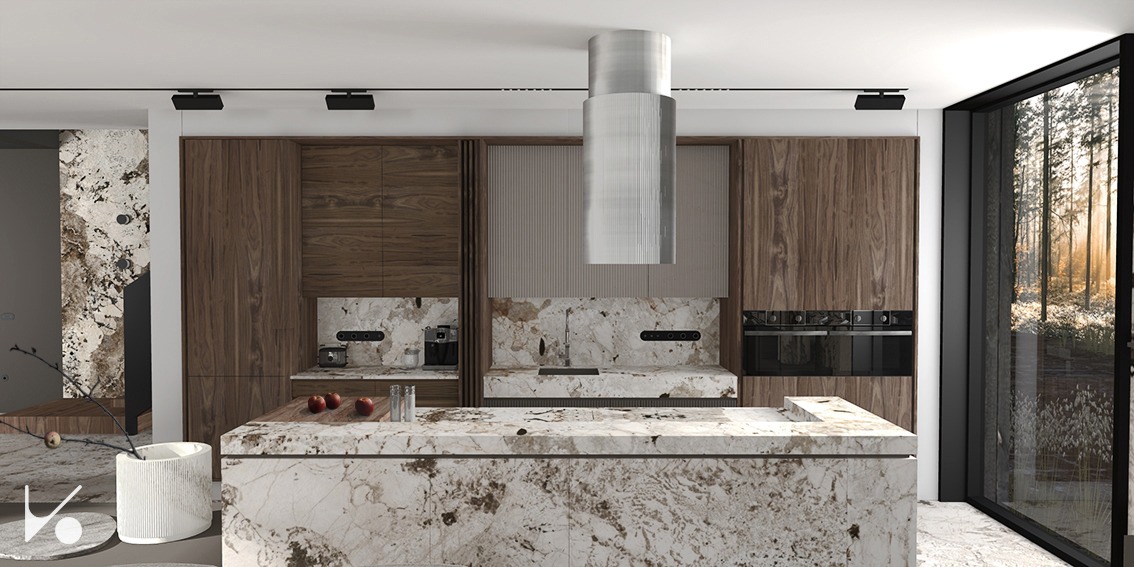 Nowoczesna kuchnia z wyspą wykończoną marmurem, drewniane szafki, stalowy okap cylindryczny, oświetlenie szynowe i widok na las za oknem.