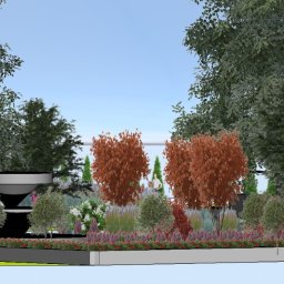 EuNike Architektura Krajobrazu Eunika Wiatr - Wizualizacja ogrodu z fontanną, drzewami i kwiatami. Widoczne osoby siedzące na ławce. Realistyczny projekt zagospodarowania przestrzeni.