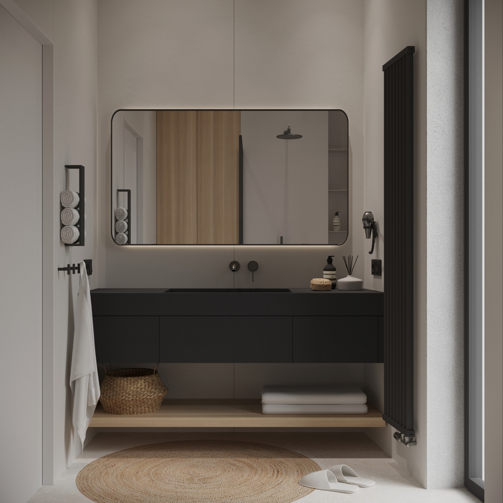 Nowoczesna łazienka z czarną szafką pod umywalką, podświetlanym lustrem, rattanowym dywanikiem i grzejnikiem drabinkowym w odcieniach szarości i beżu.