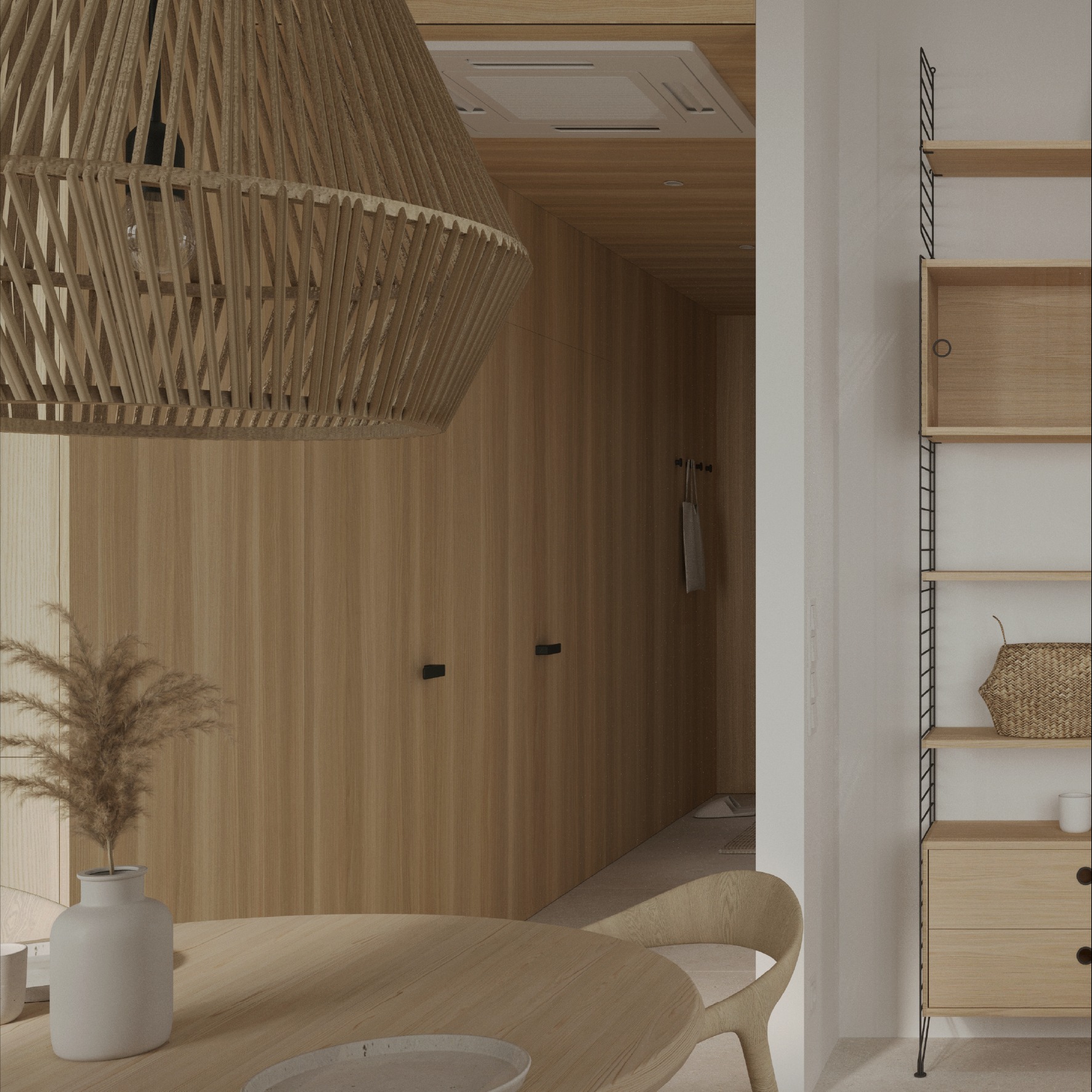 Minimalistyczna jadalnia z drewnianymi ścianami, okrągłym stołem z ceramicznym talerzem, wazonem z suszonymi trawami, wiszącą lampą z plecionki i regałem String na tle.