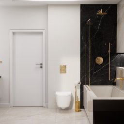 EMILIA MATYJASZCZYK ARCHITEKT WNĘTRZ - Elegancka łazienka z czarnym marmurem, złotymi akcentami i minimalistyczną toaletą podwieszaną