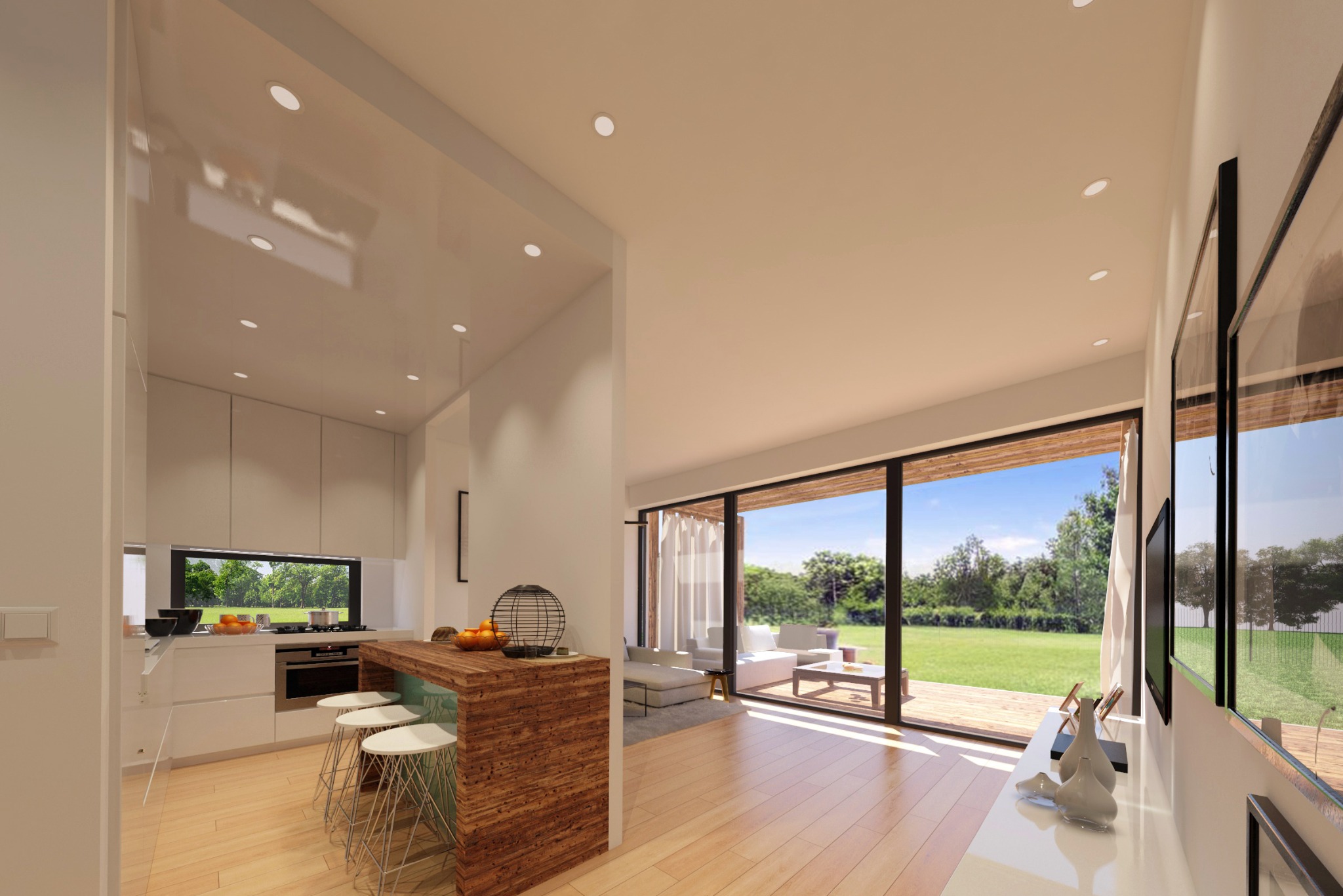Jasne wnętrze domu z otwartą kuchnią, drewnianym blatem barowym i widokiem na ogród przez duże okna przesuwne.