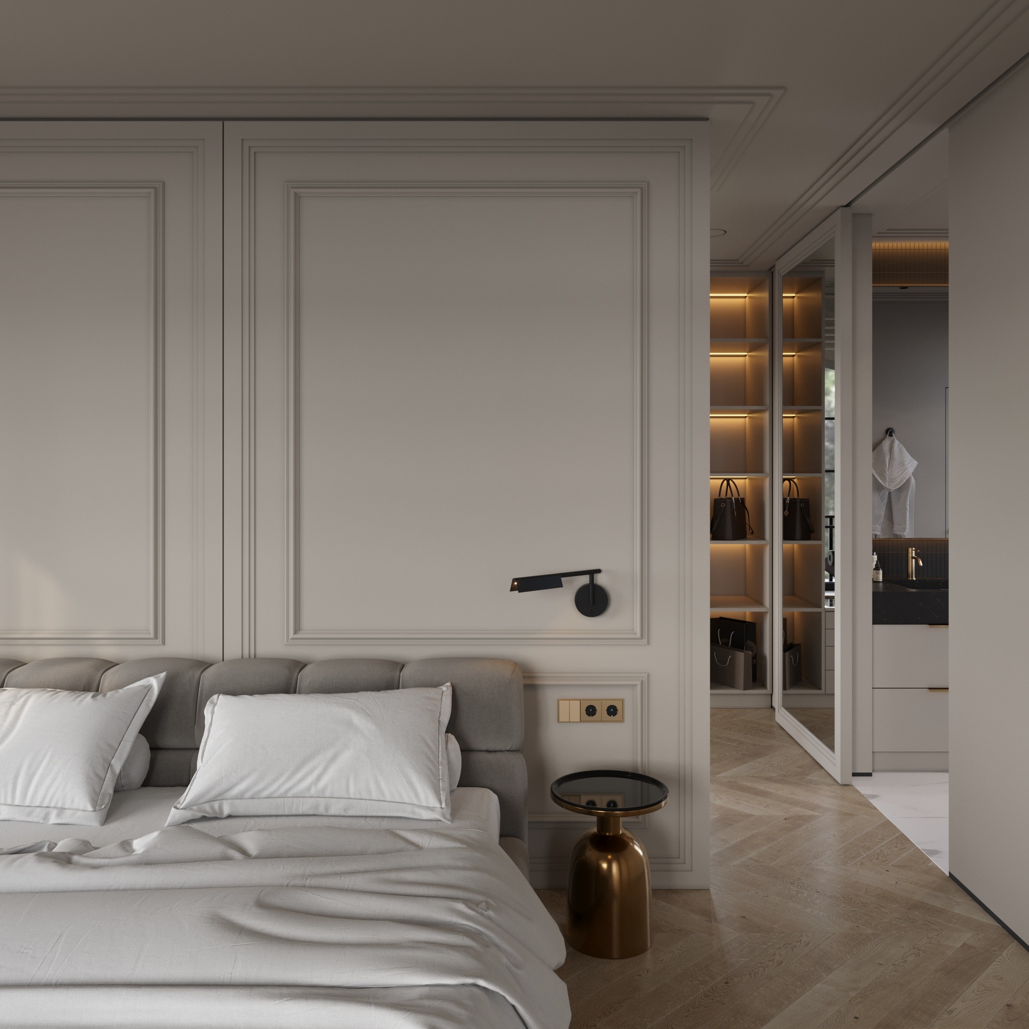 Elegancka sypialnia z łóżkiem z szarym wezgłowiem, białymi poduszkami i pościelą, stolikiem nocnym w kolorze złota oraz widokiem na garderobę z oświetleniem LED i łazienkę w tle.
