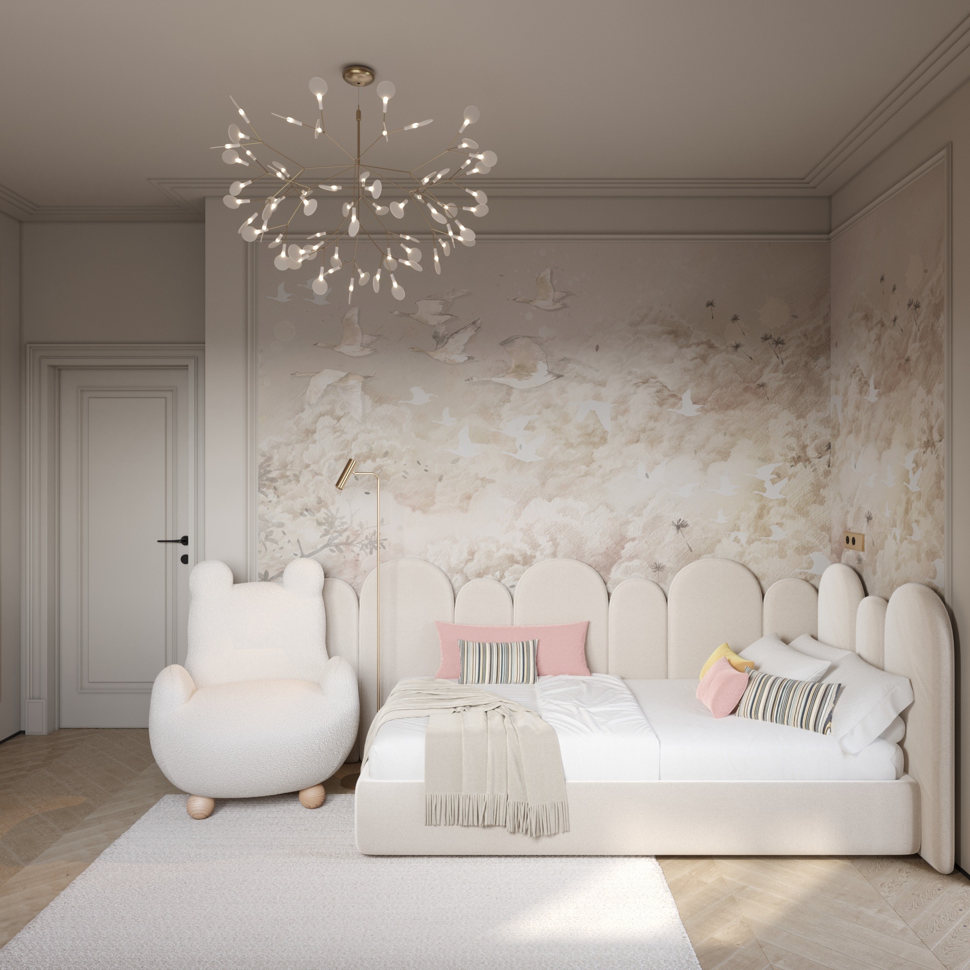 Jasny pokój dziecięcy z łóżkiem z wezgłowiem w kształcie zaokrąglonych paneli, fotel z oparciem w kształcie uszu misia, ściana z motywem ptaków w locie i nowoczesny żyrandol z licznymi punktami...