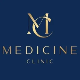 Złote logo kliniki medycznej na granatowym tle, z monogramem 'MC' i napisem 'MEDICINE CLINIC' poniżej.