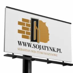 Billboard reklamujący firmę z branży budowlanej, z logo zawierającym motyw muru z cegieł i kielni, oraz adresem strony internetowej.