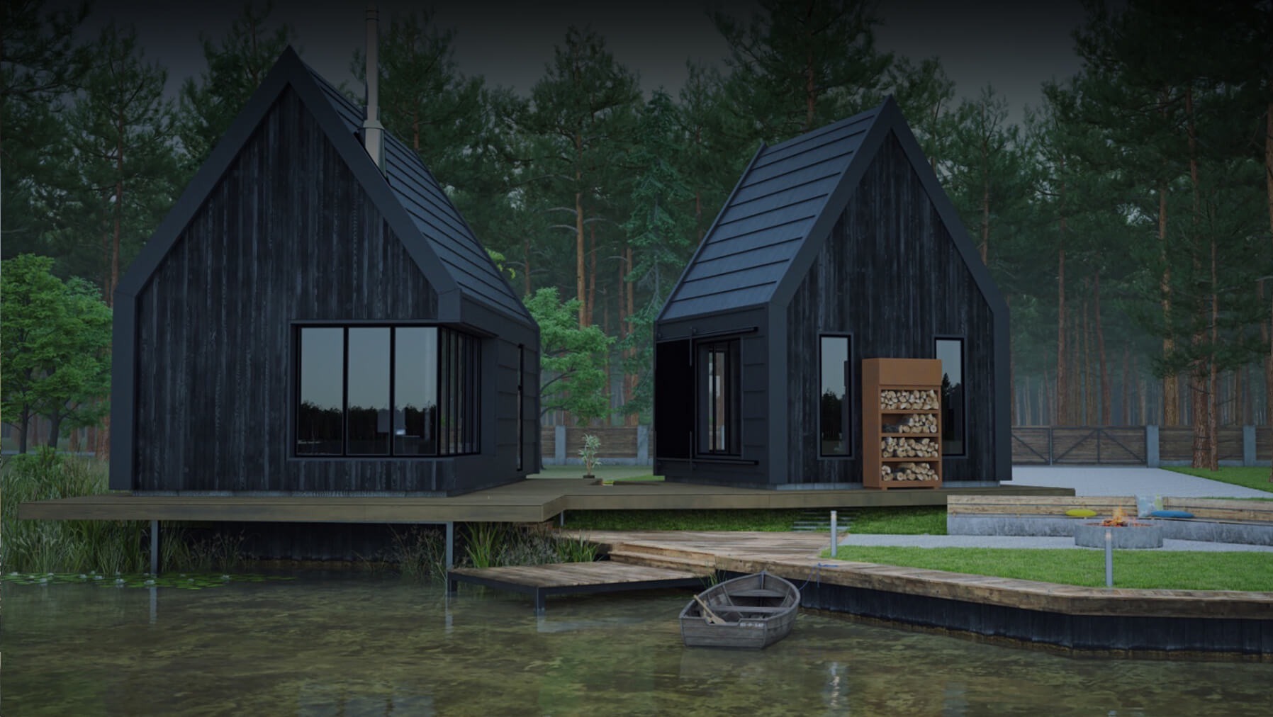 Dwa czarne domki o minimalistycznej architekturze, posadowione nad wodą, z drewnianym pomostem i łódką, otoczone lasem iglastym.