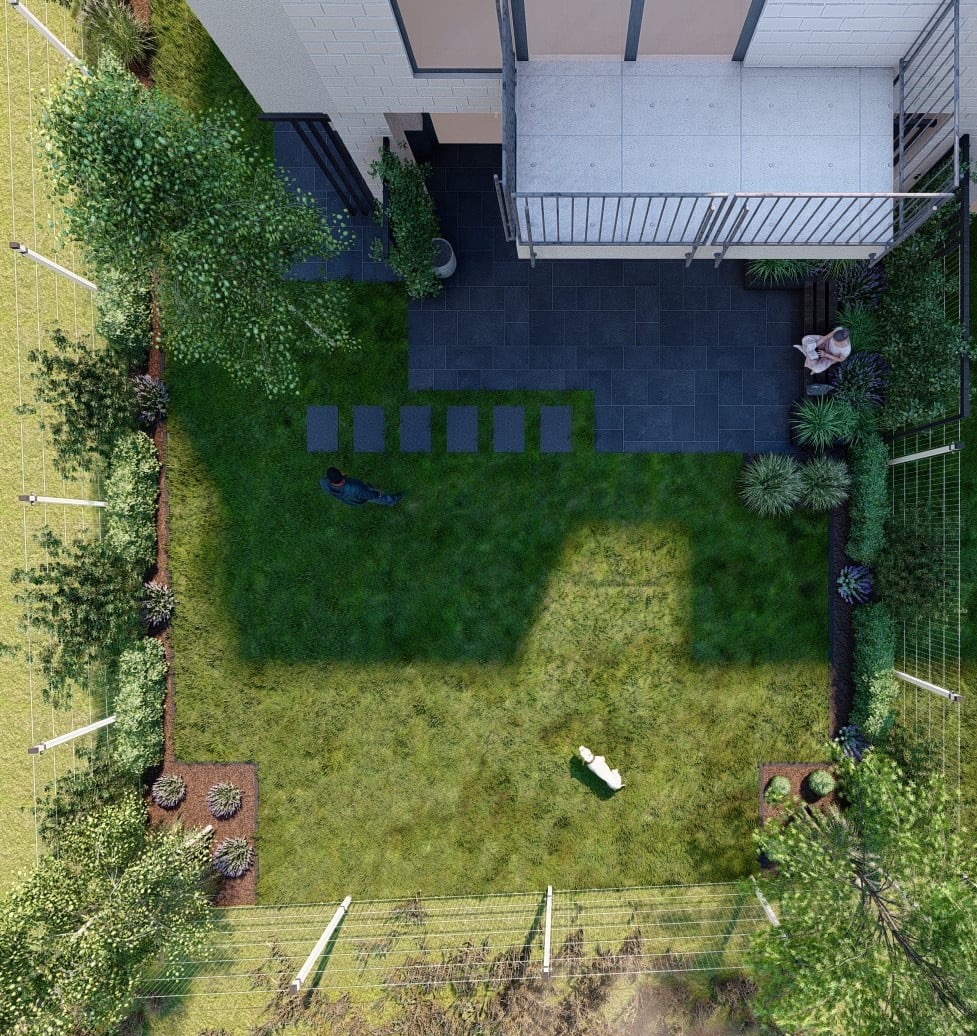 Widok z góry na nowoczesny ogród z trawnikiem, ścieżką z płyt, roślinami ozdobnymi, ogrodzeniem panelowym i osobami relaksującymi się na ławce.