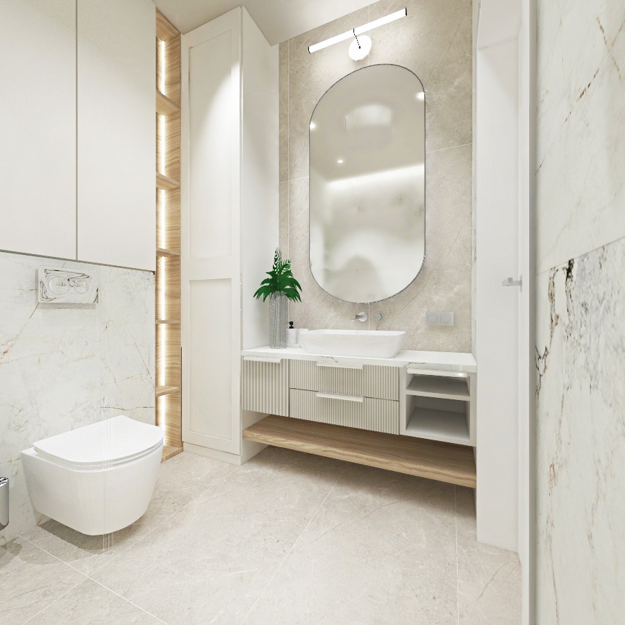 Nowoczesna łazienka z marmurowymi ścianami, owalnym lustrem podświetlanym LED, białą umywalką nablatową, szafką z szufladami i drewnianą półką, oraz wiszącą toaletą.
