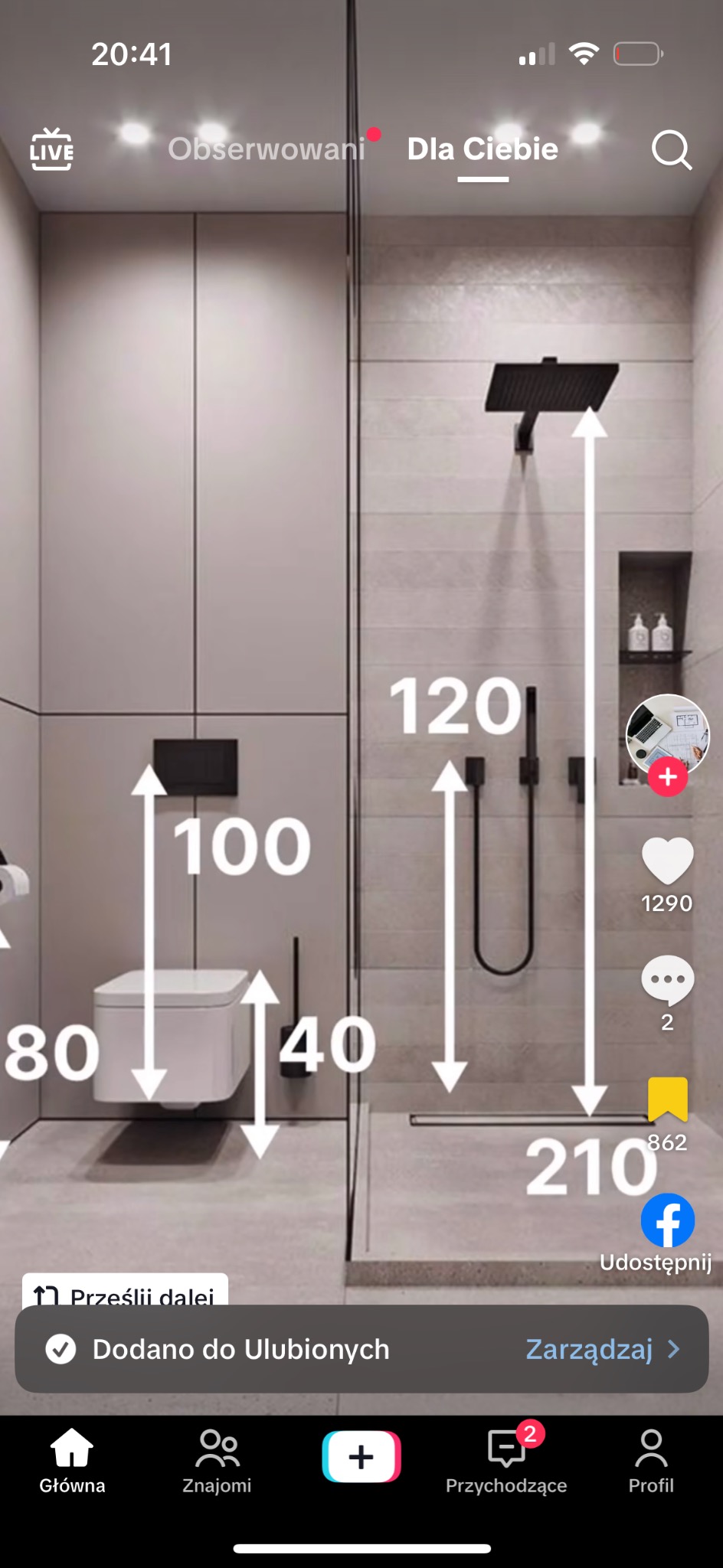 Nowoczesna łazienka z kabiną prysznicową typu walk-in, podwieszaną toaletą i minimalistyczną armaturą w kolorze czarnym, prezentowana z naniesionymi wymiarami.