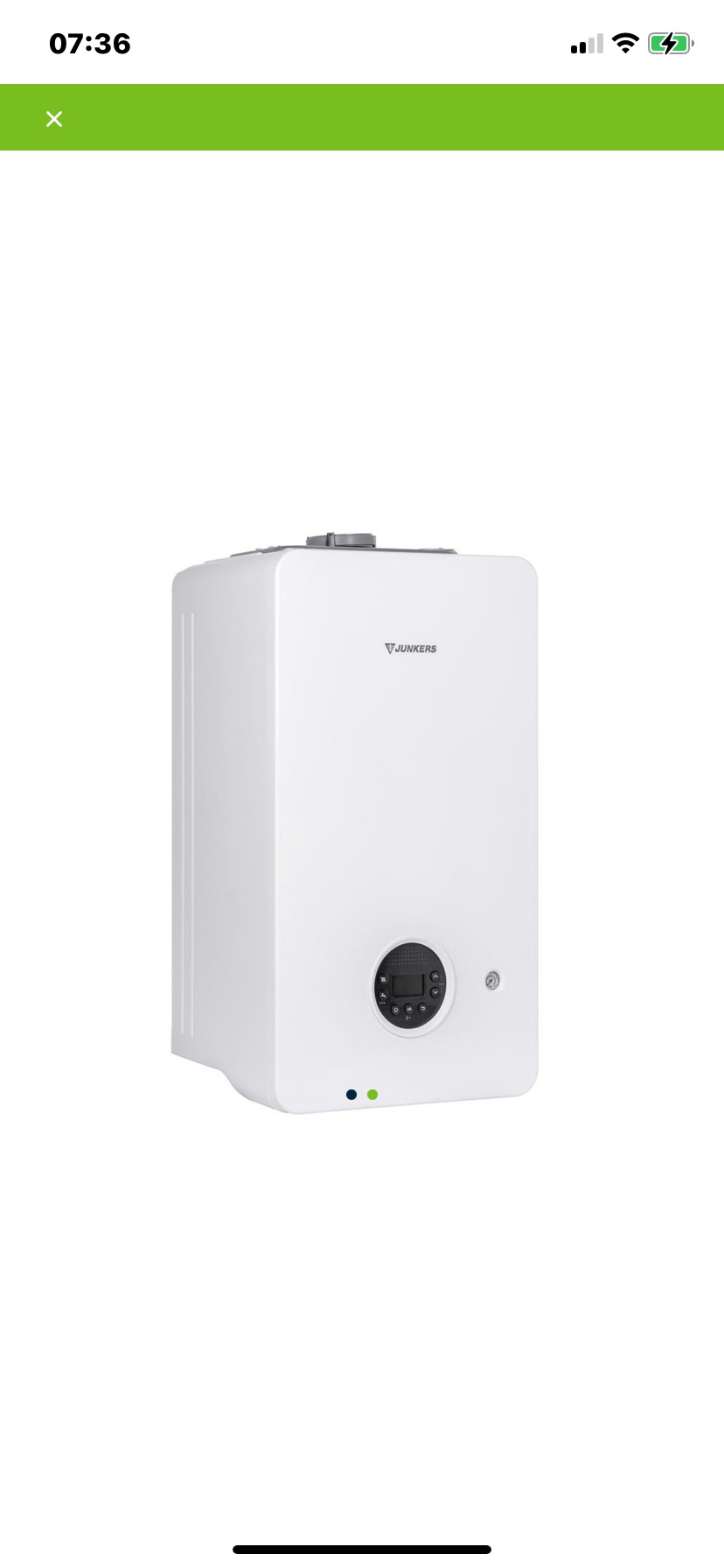 Nowoczesny, biały piec gazowy marki Junkers, widok z przodu, z widocznym panelem sterowania i diodami LED.