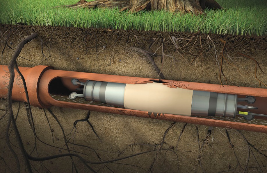 Przekrój ziemi z uszkodzoną rurą i sprzętem do naprawy bezwykopowej, widoczne korzenie i trawa.