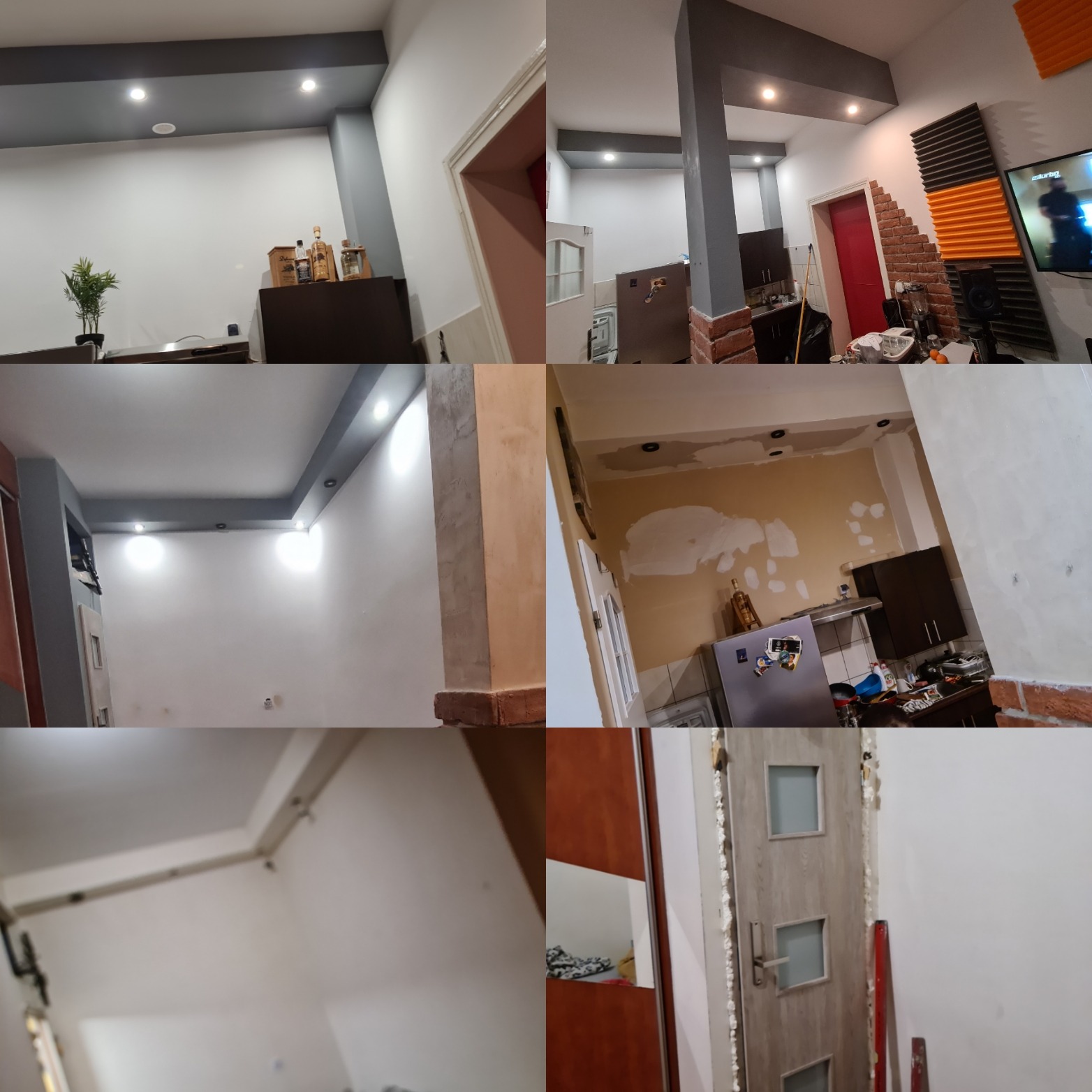 Wnętrze mieszkania w trakcie prac wykończeniowych: ściany częściowo pomalowane na biało i szaro, widoczne niedoskonałości i przygotowania do dalszych prac, fragmenty ścian z cegły dekoracyjnej...