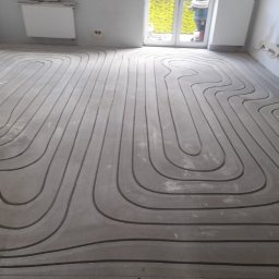 Ewgeniusz Genek - Wymiana Grzejnik&oacute;w Warszawa