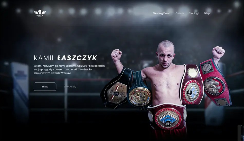Strona internetowa boksera Kamila Łaszczyka z jego zdjęciem z pasami mistrzowskimi WBO, WBC i innymi, widoczne menu strony głównej, treningi i sklep.