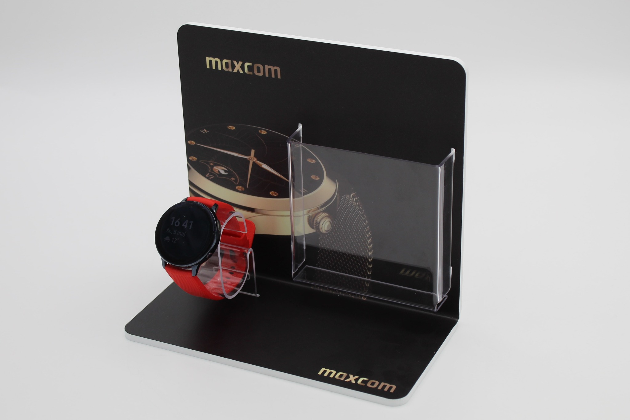 Elegancki pojedynczy ekspozytor na zegarek z PCV oraz kieszonką na ulotki.