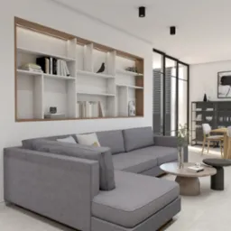 Nowoczesny salon z szarą sofą narożną, drewnianym stolikiem kawowym i wbudowanym regałem z oświetleniem LED, widok na jadalnię z czarną witryną i obrazem.