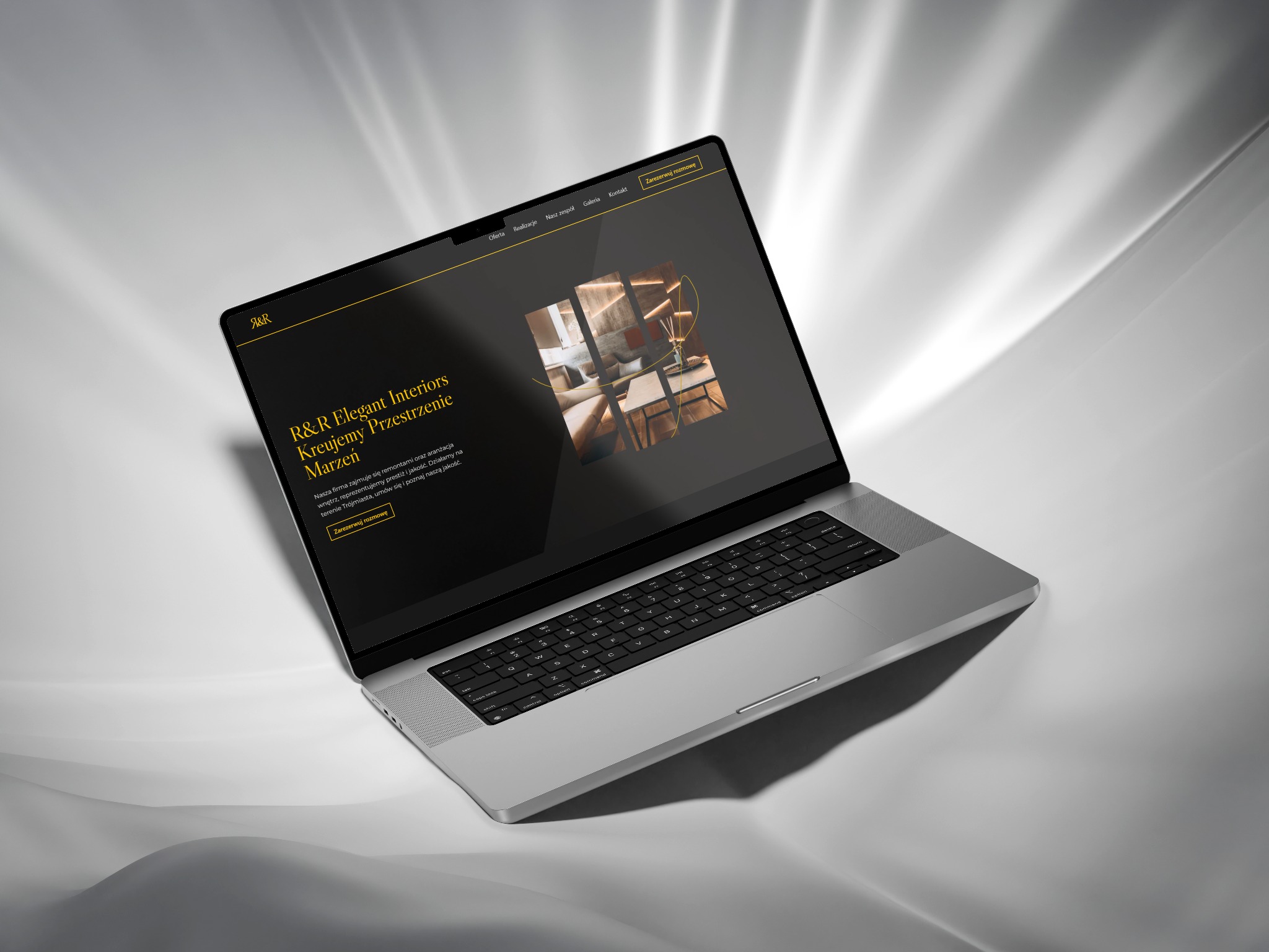 Laptop z wyświetloną stroną internetową firmy R&R Elegant Interiors, specjalizującej się w aranżacji wnętrz, na abstrakcyjnym, jasnoszarym tle.