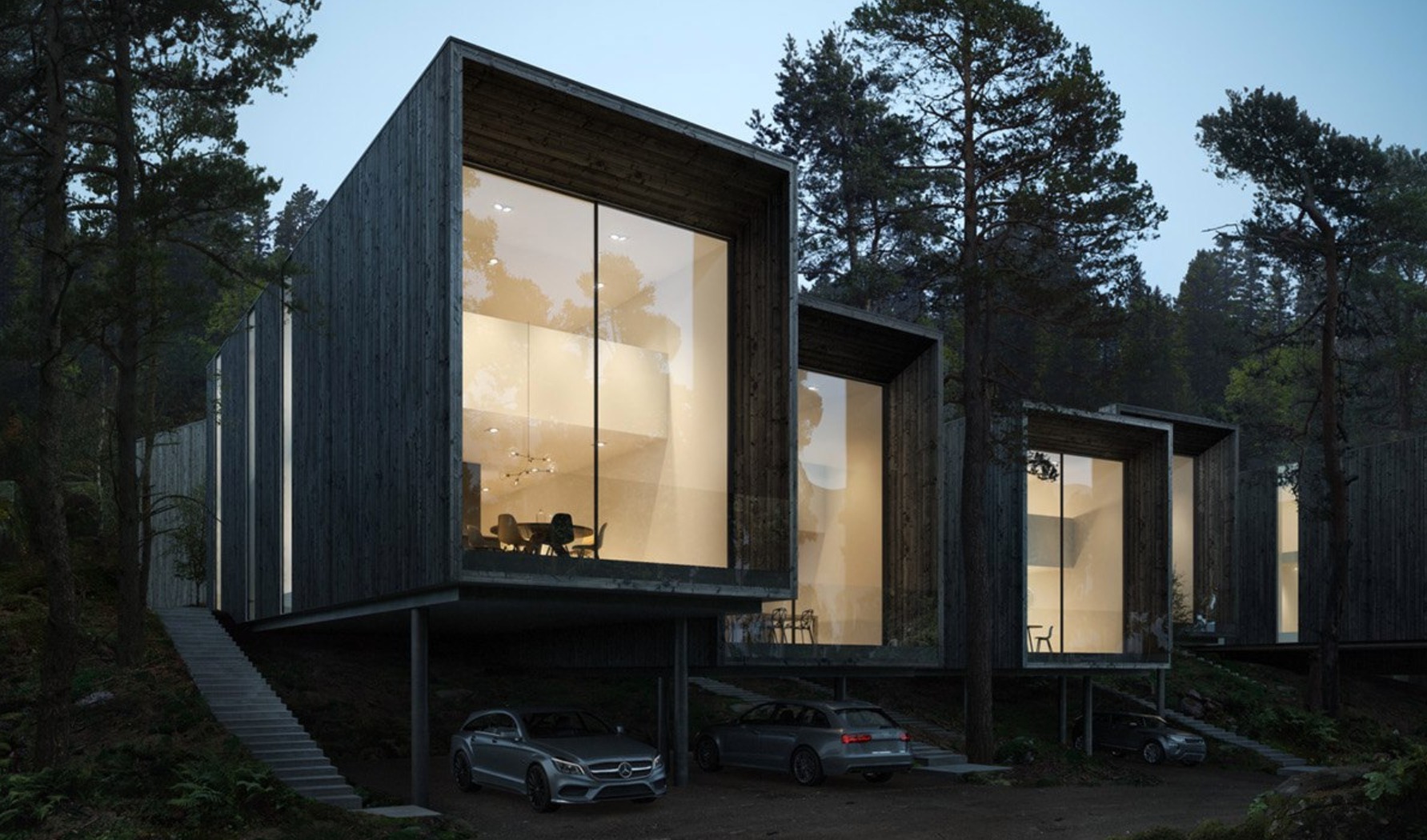Nowoczesne, modułowe domy z ciemnego drewna, osadzone na palach w leśnym otoczeniu, z dużymi przeszkleniami i widocznymi detalami wnętrz, takie jak designerski żyrandol i meble. Pod domami...