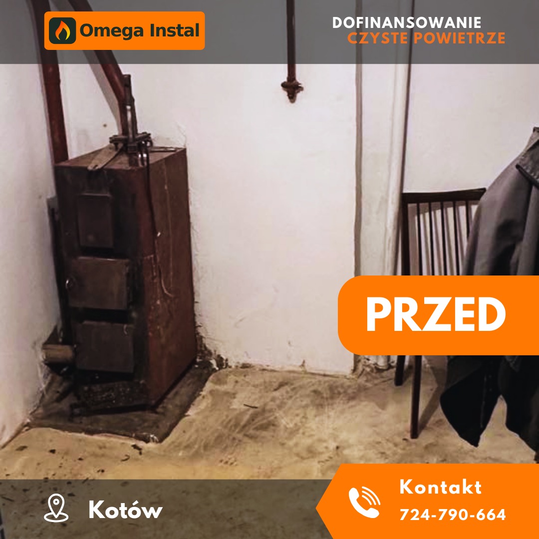 Stary, zardzewiały piec węglowy w piwnicy przed wymianą, widoczne ślady wilgoci na ścianach i podłodze, oznaczenie 'PRZED' sugerujące realizację w ramach programu Czyste Powietrze.