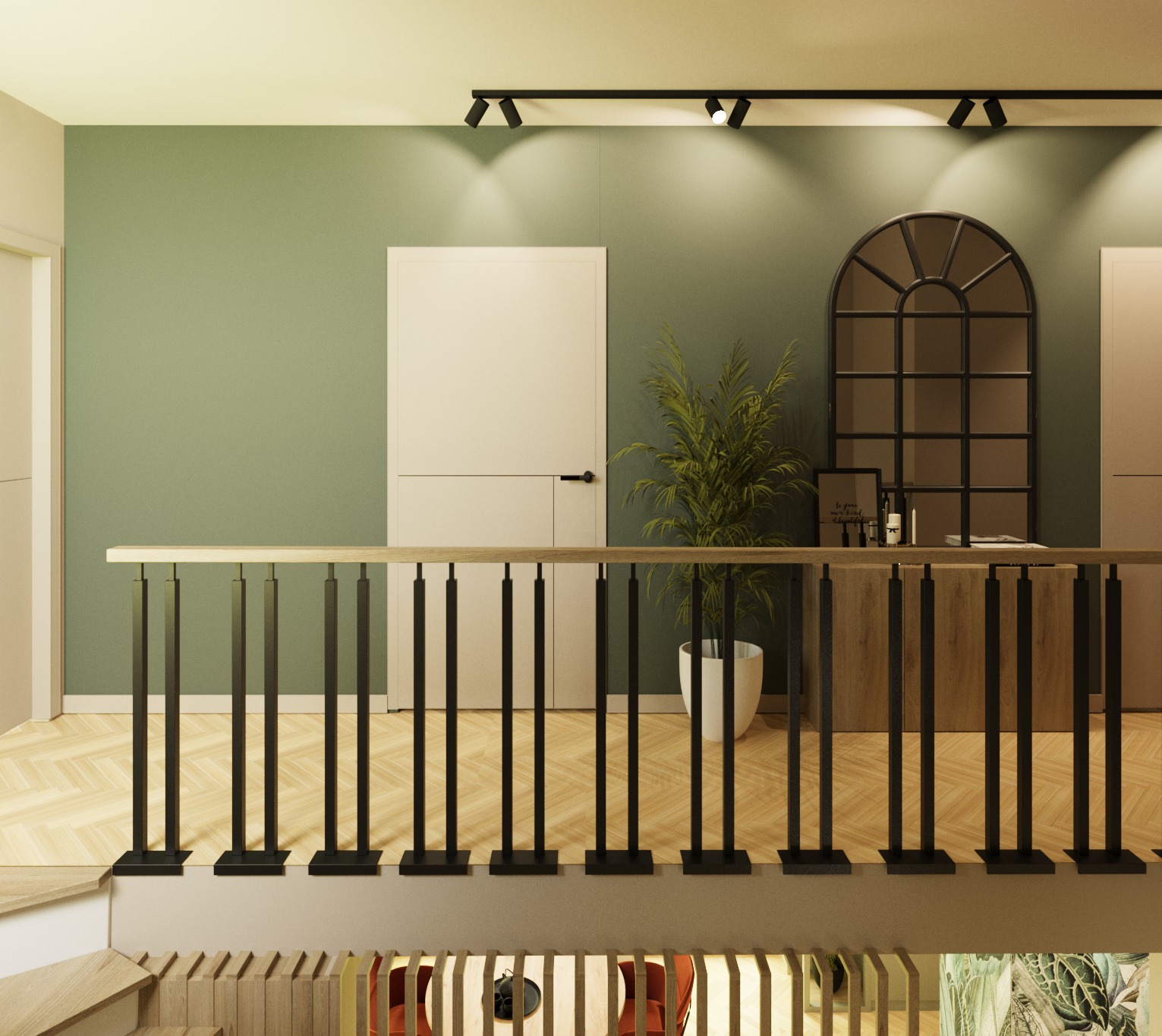 Wnętrze domu z zieloną ścianą, białymi drzwiami i czarną metalową ramą okienną, widok z góry przez balustradę