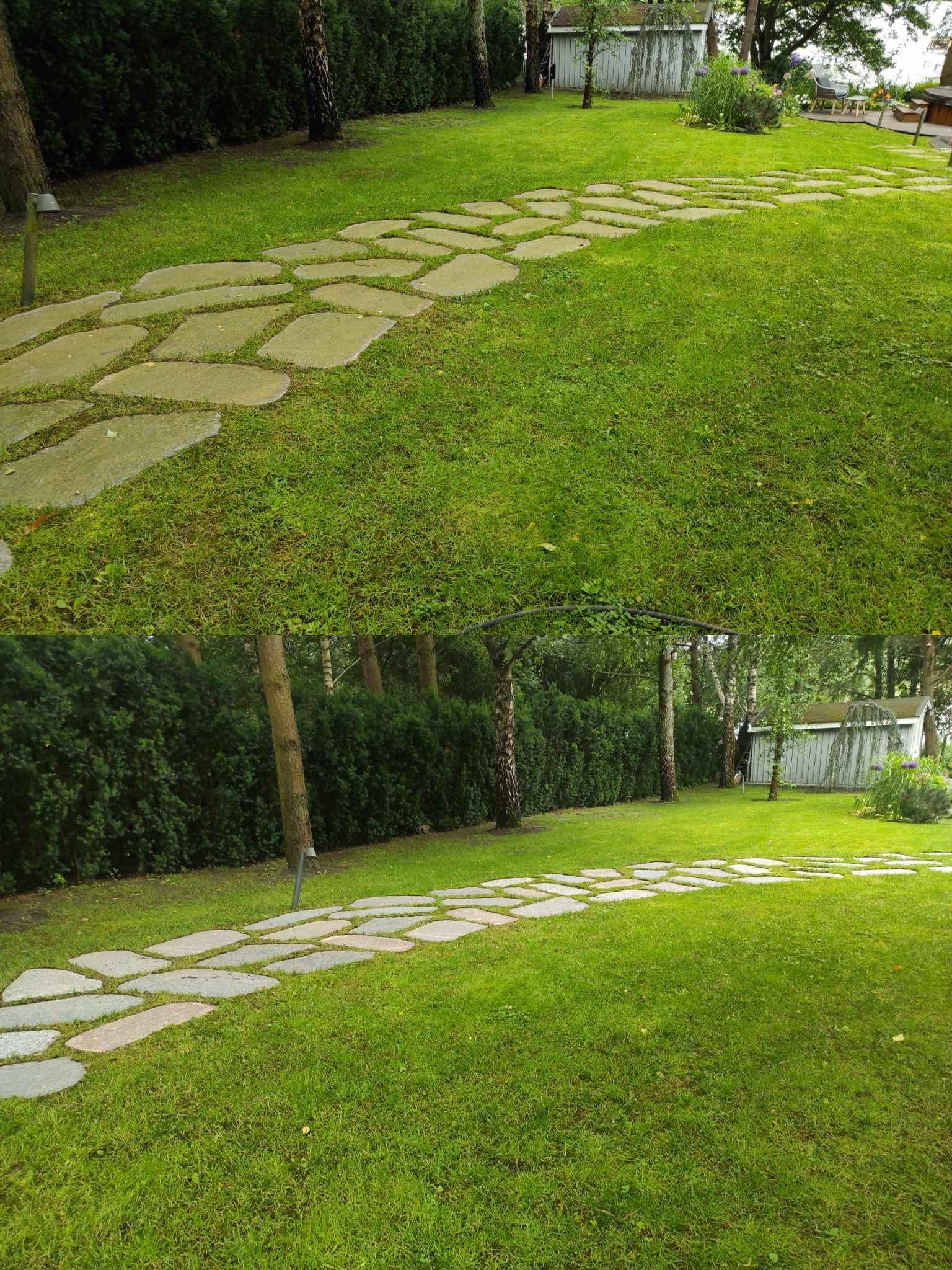 Ścieżka z nieregularnych kamieni prowadząca przez zadbany trawnik w ogrodzie, z żywopłotem i drzewami w tle, zakończona małym domkiem.