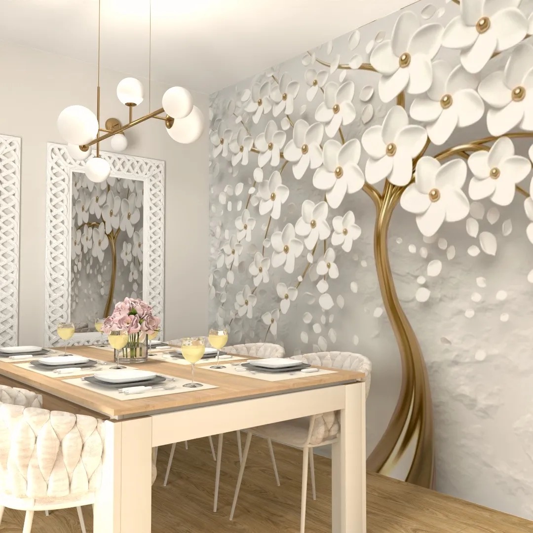 Jadalnia z drewnianym stołem nakrytym dla sześciu osób, z białymi krzesłami i dekoracyjną ścianą z motywem drzewa z białymi kwiatami 3D oraz lustrem powtarzającym motyw drzewa.