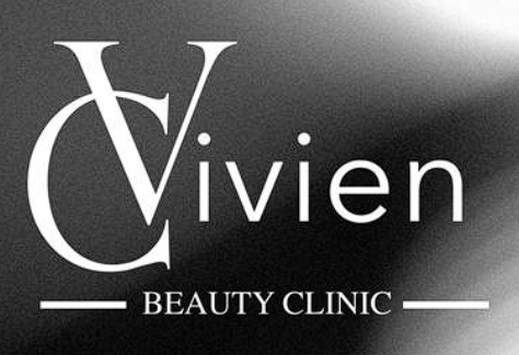 Logo Vivien Beauty Clinic na czarnym tle z delikatnym rozmyciem.