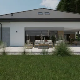 Nowoczesny parterowy dom w Kielcach z tarasem i meblami ogrodowymi, widok z perspektywy trawnika, na pierwszym planie ozdobne trawy.