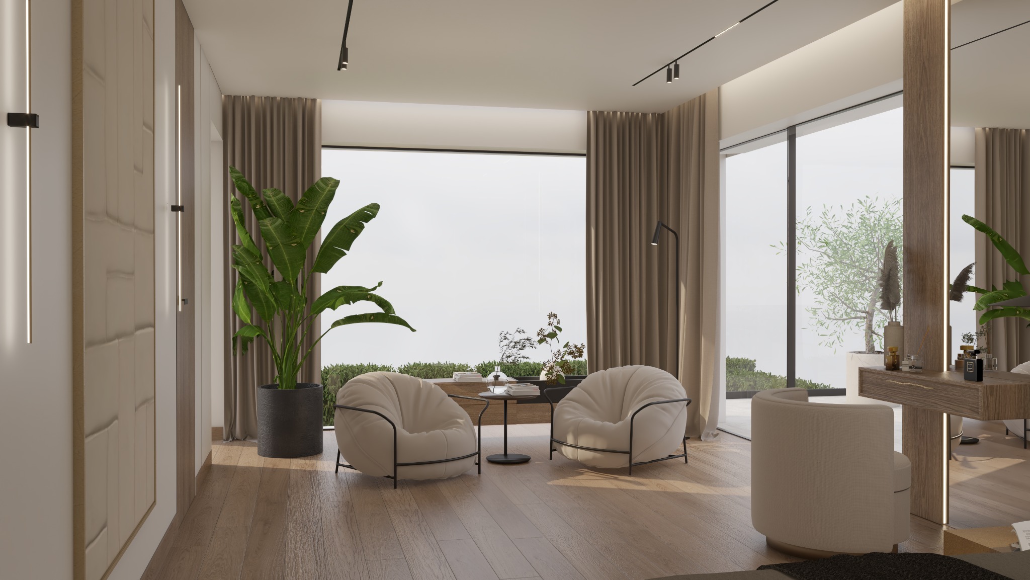 Jasne wnętrze z dwiema okrągłymi fotelami, stolikiem i dużą rośliną doniczkową przy oknie. Drewniana podłoga i elementy dekoracyjne tworzą przytulną atmosferę.