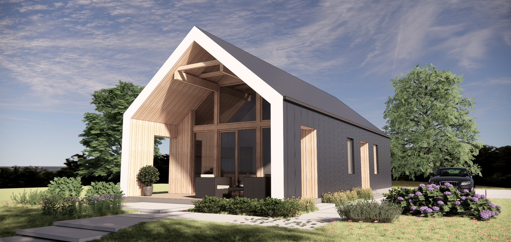 Wizualizacja domu modułowego z szarą elewacją, drewnianymi elementami wykończeniowymi, dużymi przeszkleniami i tarasem z meblami ogrodowymi, otoczonego zielenią i kwitnącymi hortensjami.
